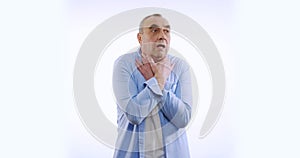 Old man suffocating and suffering sharp chest pain. Isolated on white.