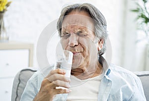 Old man with tooth sensitivity