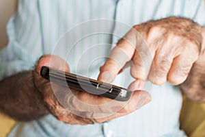 Old man using a smartphone