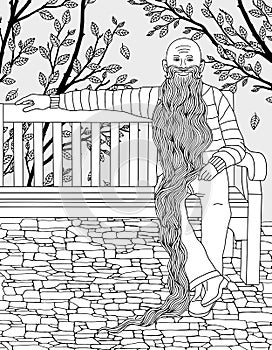 Old man with a very long beard in the park