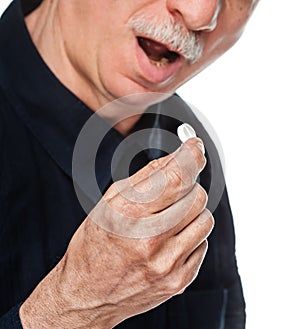 Old man wants to take a pill