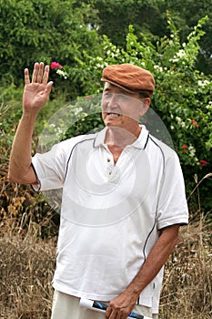 Old man waving