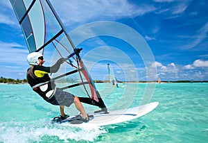 Old man windsurfing on Bonaire.