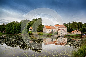 An old manor house Vihula in Estonia, Lahemaa park. Beautiful summer landscape with pond