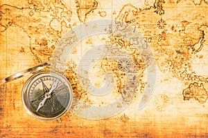 Old map with an ancient compass