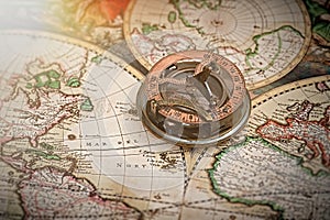 Old map, compass , navigation and geography . photo