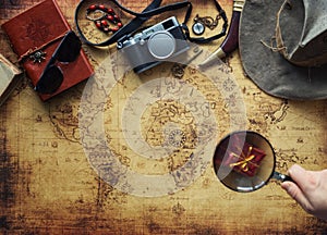 Old map and vintage travel equipment / expedition concept, treasure hunt