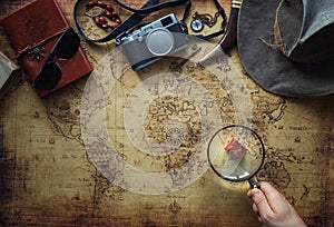 Old map and vintage travel equipment / expedition concept, treasure hunt