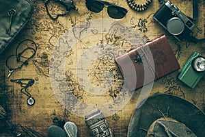 Old map, vintage travel equipment and souvenirs from the travel around the world / place for your text