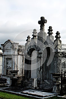 Old marble crypts in a cemetery photo