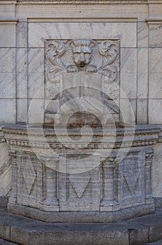 An old marble fountain in Bellinzona