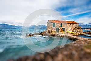 Old marina with lonely House