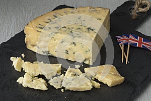 Old mature wedge of blue Stilton cheese