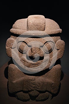 Maya figure made out of stone photo