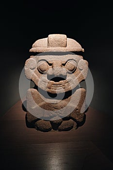 Maya figure made out of stone photo