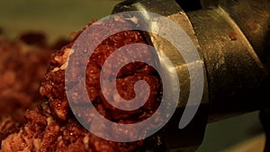 Old meat grinder scrolls meat