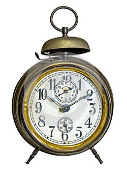 Old mechanical alarm clock with bell on the top, isolated