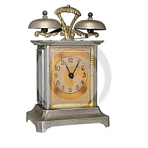 Old mechanical alarm clock with two bells, isolated