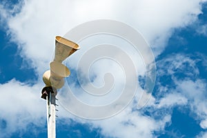 Old mechanical civil defense siren, also known as air-raid siren