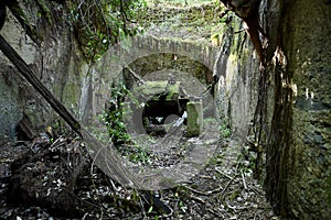 Old mechanical machinery inside a building in the abandoned mines of Calferro in the Mulina di Stazzema archaeological mining park photo