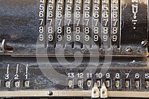 Old mechanical manual counting machine for mathematical calculations