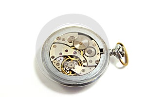 Old mechanical watch on white background