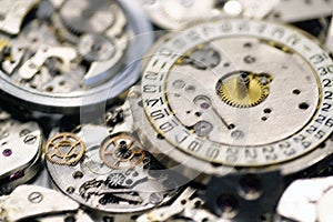 Old mechanical watches with gears and cogs. Watch or clock mechanisms