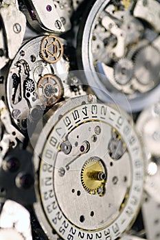 Old mechanical watches with gears and cogs. Watch or clock mechanisms