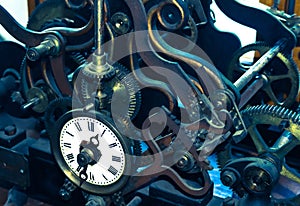 Old mechanism of a big tower clock. Clockwork large vintage clock. Gear mechanism.