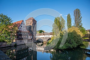 Old medieval bridge over Pegnitz river in Nuremberg, Germany