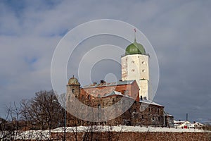 old medieval castle in Vyborg, Russia with the white tower, winter view