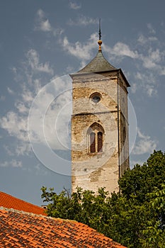 Old medieval church clock tower in Bac