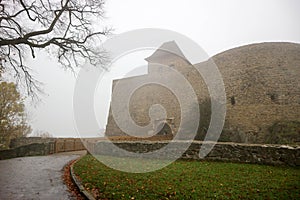Old medieval fortress Helfstyn in Czech republic in the autumn morning fog
