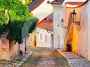 Old medieval narrow cobbled street and small ancient houses of Novy Svet, Hradcany district, Prague, Czech Republic
