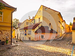 Old medieval narrow cobbled street and small ancient houses of Novy Svet, Hradcany district, Prague, Czech Republic