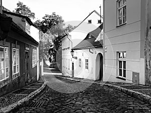 Old medieval narrow cobbled street and small ancient houses of Novy Svet, Hradcany district, Prague, Czech Republic