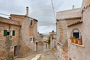 Old medieval residential houses in the village Capdepera. Island Majorca, Spain.