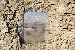 Old medieval ruined castle window with landscape view