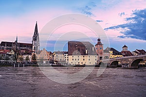 Old medieval stone bridge and historic old town in Regensburg, Germany