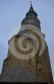 Old medieval stone clock tower in Dinan, France