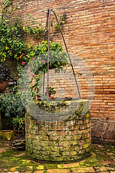 An old medieval water well of a typical medieval small village