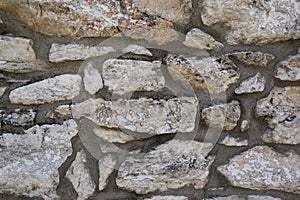 Old mediterranean style stone wall of the house