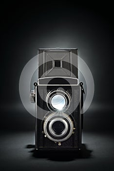 Old medium format camera on black