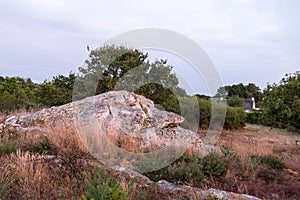 Old megalith in Le Brunet on a sunny evening in summer