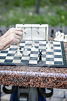 old men playing chess. Active retired people, old friends and free time. Active retired people old friends and free time