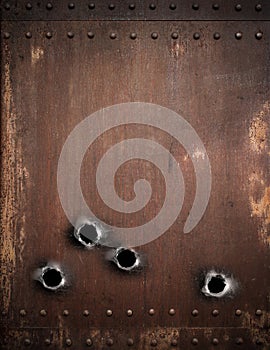 Old metal background with bullet holes