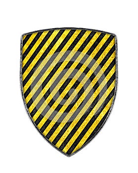 Old metal black and yellow striped shield isolated on white