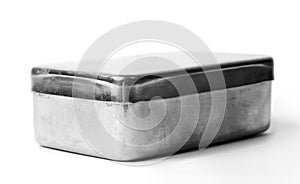 Old metal box on white