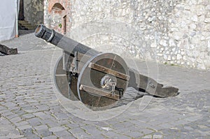 Old metal cannon on the wall of the fortress
