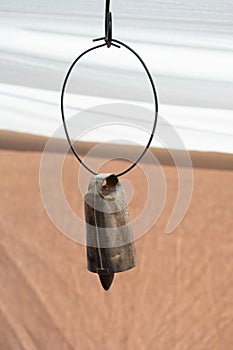 An old metal cowbell used to locate cattle